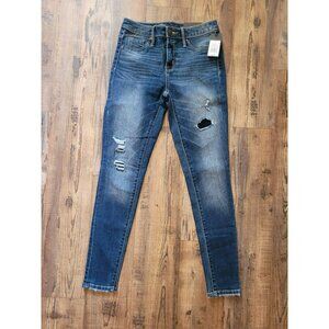 Mossimo High Rise Jegging Size 0/25R  Womens Distressed Med Wash Power Stretch